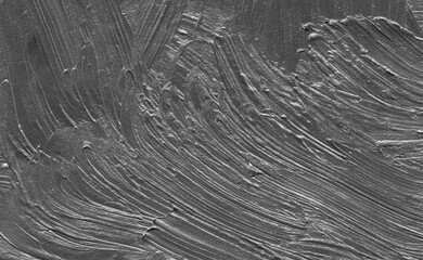 Dark gray abstract plaster texture featuring expressive brush strokes and rough concrete surface details. Ideal background for modern design, architecture visuals, posters, and creative layouts.