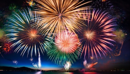 colorful fireworks burst in night sky creating vibrant display of light and joy bright colors illuminate darkness celebrating special occasions