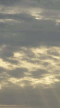 Clouds at cloudy day at sunset. 4K Vertical. Time Lapse