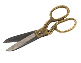 Antique brass shears on a white background