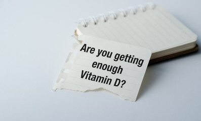 A piece of paper with the words Are you Getting Enough Vitamin D written on it.