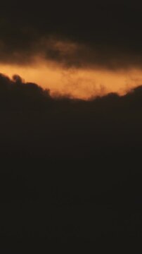 Clouds at sunset. Time Lapse. 4K Vertical