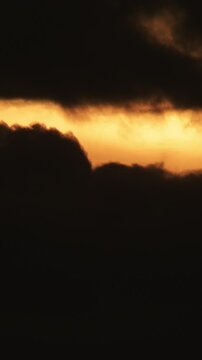 Clouds moving at sunset. Time Lapse. 4K Vertical