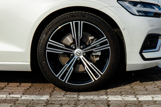 December 18, 2021, Seoul, South Korea - A close-up of the front wheel with a Continental tire on a white Volvo S60 sedan.