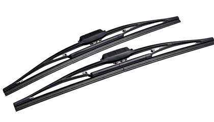 Two dark grey car windshield wiper blades, with angled diagonally on a, isolated on a transp 