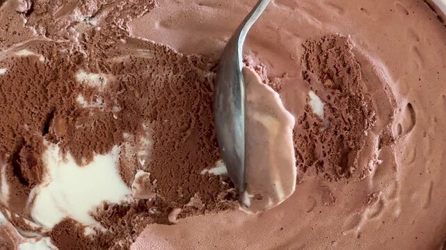 Spooning Delicious Chocolate Rocky Road Ice Cream