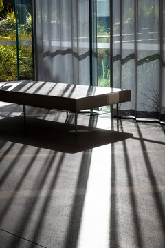 Modern empty interior with light streaming through glass-wall blinds, Sydney, NSW, Australia