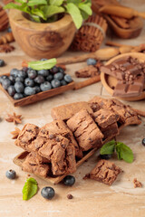 Fototapeta premium Brownie with fresh blueberries and mint.