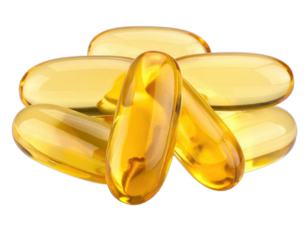 A cluster of transparent, golden-yellow softgel capsules arranged on a black backdrop