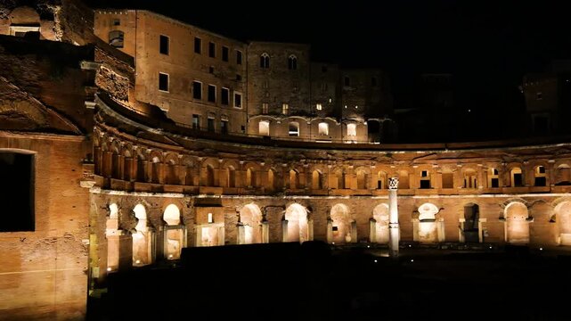 night curved multi level brick arcades illuminated arches layered imperial architecture stands trajan's market view rome italy roman empire emperor scene 