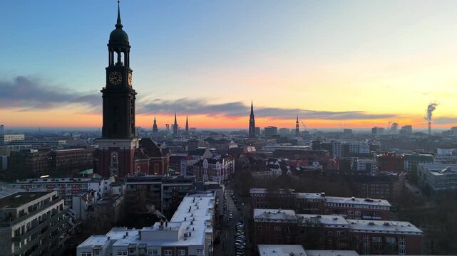 Aerial drone footage (forward flight) of the famous St. Michaelis Church at sunrise in Hamburg