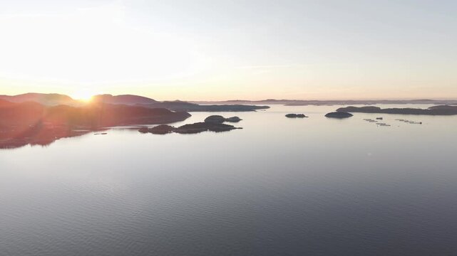 Aerial view of sunset over sea toward Stavanger, Norway