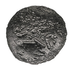 Black natural glass Thait - tektite is a rock that is formed by the impact of an extraterrestrial body (meteorite) on the Earth's surface, Chaiyaphum location in Thailand © Pecold