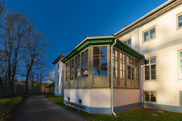 Historic Vilce Manor house with glass veranda in Latvia