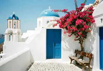 A striking editorial photograph of Santorini's classic architecture, ideal for travel magazines, guidebooks, and online articles.
