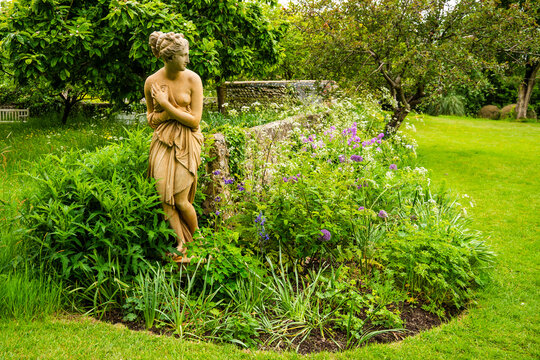 Flower garden of Monk's House, former home of writer Virginia Woolf, historic literary landmark surrounded by nature in East Sussex, United Kingdom.