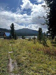 Countryside getaway scene, Serene rural landscape with mountain