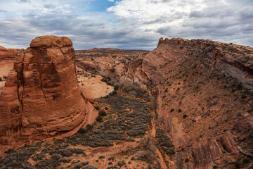 This fine art photograph captures the timeless beauty of the sandstone arches of **Arches National Park**, located just outside Moab, one of the most iconic landscapes in the American Southwest. C