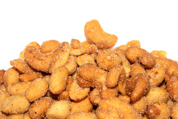 Close up of salt and sugared cashew nuts and peanuts
