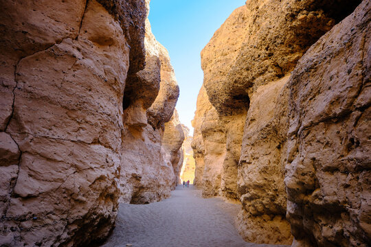 People walking in the Rock Formations Inside Sesriem Canyon, Namibia, Africa.