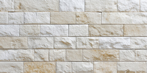 Beige and white textured brick wall with natural stone pattern