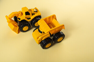 Colorful toys on a yellow background