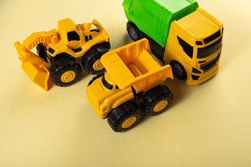 Colorful toys on a yellow background