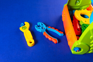 Colorful toys on a blue background
