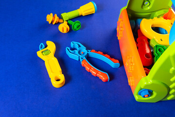Colorful toys on a blue background