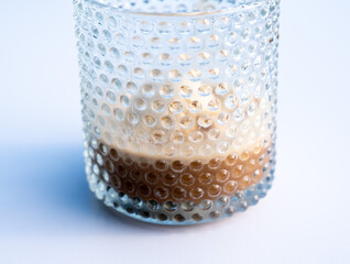 Affogato al caff&egrave;: a scoop of creamy vanilla ice cream drowned in hot espresso, a classic Italian dessert, styled on a small plate Malta, 11 DEC 2025.