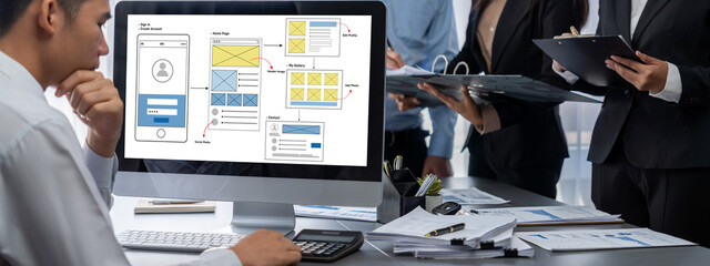 Business intelligence and data analysis concept. Analyst team working on financial data analysis dashboard on laptop screen as marketing indication for effective business strategic planning. Insight