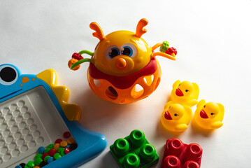 Fototapeta premium Colorful toys on a white background