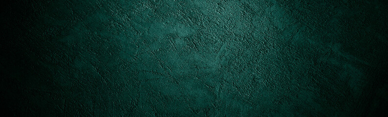 Black dark green blue emerald teal viridian texture background. Painted concrete wall surface. Grunge rough uneven plaster scratched damaged. Close-up. Blant template design ad. Wide banner. Panoramic