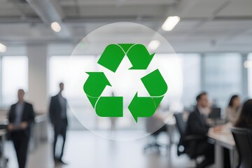 Green recycling symbol on glass with blurred office environment in the background