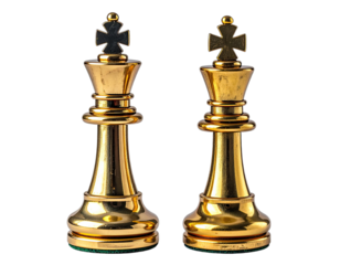 Close-up view of two shiny golden chess king pieces standing side by side, isolated