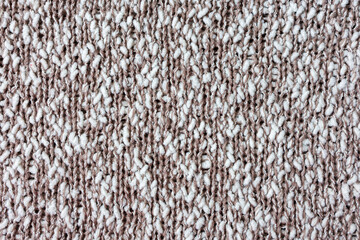 Handmade knitted textile with dense melange yarn pattern © Iryna Medvedeva