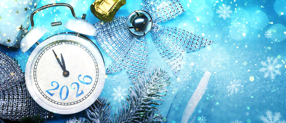 Happy New Year 2026 card with alarm clock, Christmas decor and snowflakes on light blue background