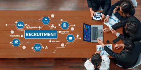 A professional team engages in a collaborative meeting focused on innovative recruitment strategies, utilizing technology and data to enhance hiring processes and decision-making. Amity