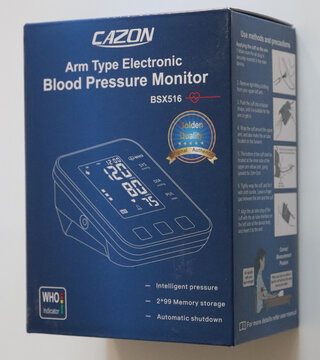 Norwich, england november 26 2025 cazon arm type electronic blood pressure monitor box isolated on white background