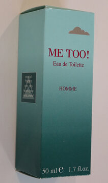 Norwich, england november 26 2025 me too perfume box with teal gradient and red lettering isolated on white background