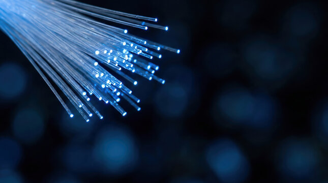 Blue fiber optic cable lights macro technology background - Powered by Adobe