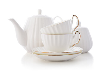 Two white golden rimmed porcelain tea cups with saucers, a bone china teapot and a sugar bowl