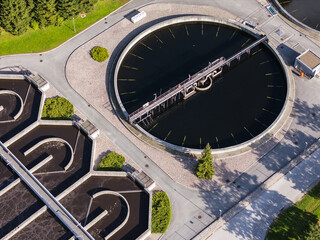 Advanced wastewater treatment facilities integrated into urban planning. The focus is on innovative technology for sustainable development.