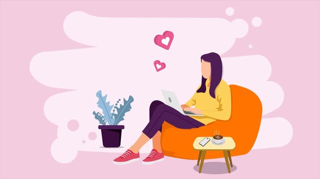 Woman sitting on bean bag with laptop and coffee on table