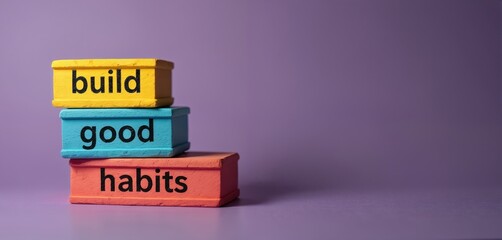 Colorful wooden blocks stacked show phrase build good habits for self-improvement and personal growth. Concept for positive changes and habit formation.