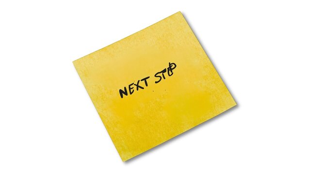 Yellow sticky note showing next step reminder concept