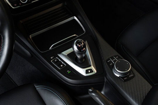 Black BMW M2 gear shifter knob close up, Sports coupe interior console