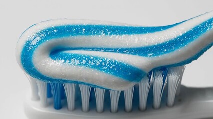 Toothpaste Squeezed onto Toothbrush Dental Hygiene Macro Shot