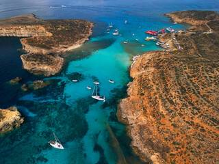 Blue Lagoon, Camino Island - aerial drone view, Malta coastline
