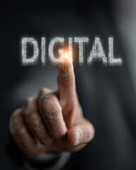Business person touching word digital, symbolizing transformation and innovation